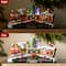 Glitzhome® 20" Lighted Christmas Santa Train Resin Village with Movement and Music